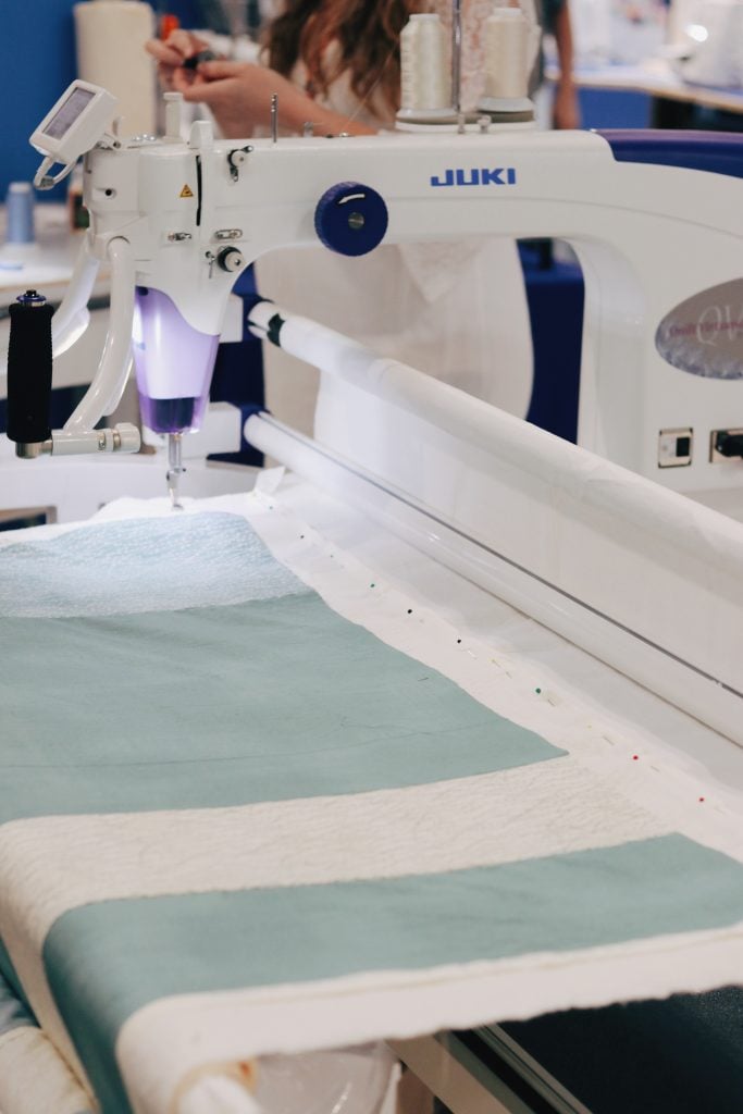Janet Clare fabric quilt on the Juki long arm
