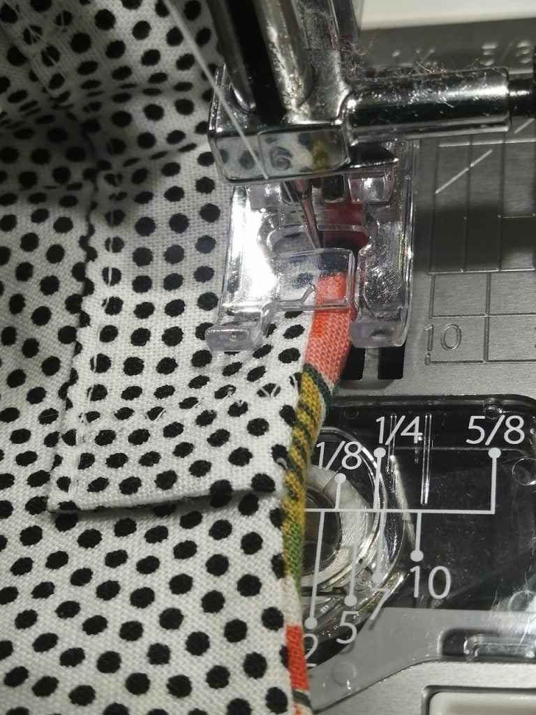 Topstitching the mask.